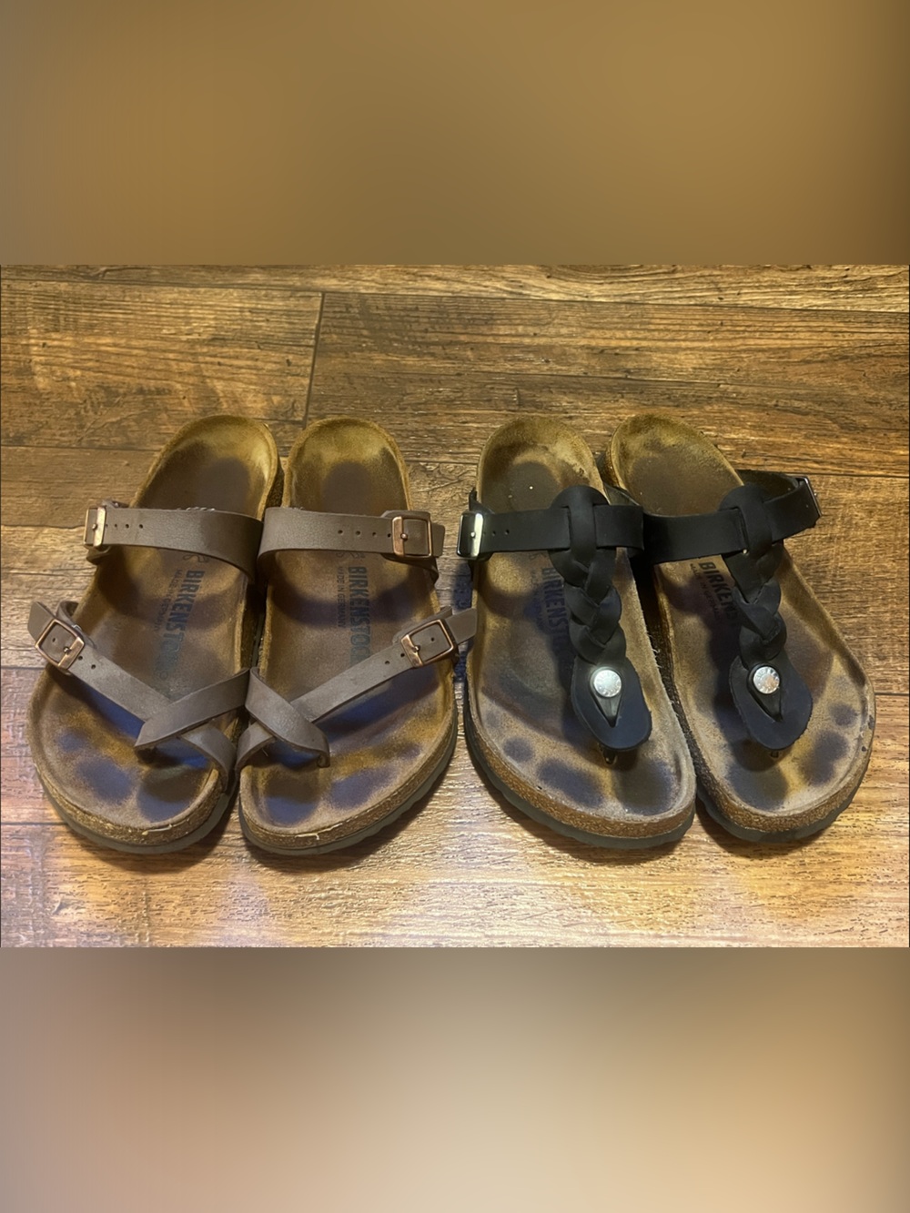 Birkenstock Brown and Black Sandal Pair